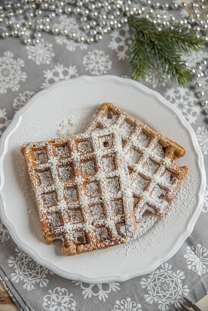 istock Christmas Waffles with sugar and sprinkles 621257766