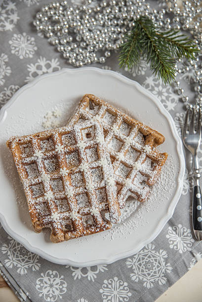 istock Christmas Waffles with sugar and sprinkles 621257840