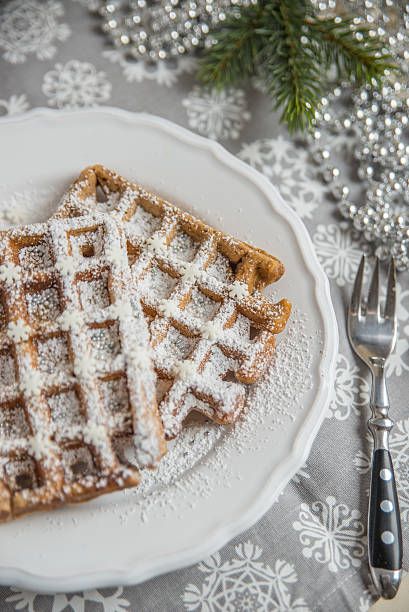 istock Christmas Waffles with sugar and sprinkles 621257930