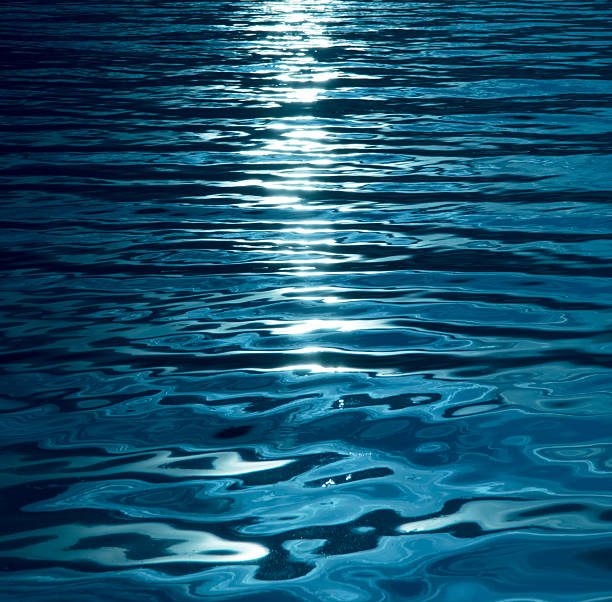 istock Artistic blue pattern on black with shapes, stripes and waves 621257954
