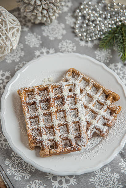 istock Christmas Waffles with sugar and sprinkles 621258002