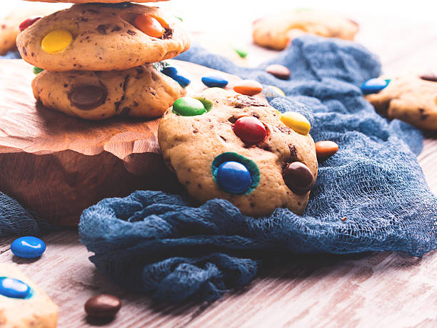istock Chocolate chip cookies with candies. Retro toned 621259382