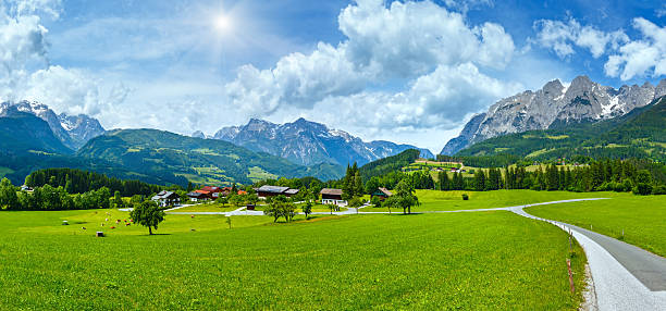 istock Summer sunshiny Alpine country panorama 621259418