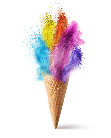 Wafer cone with colored powder explosion isolated on white
