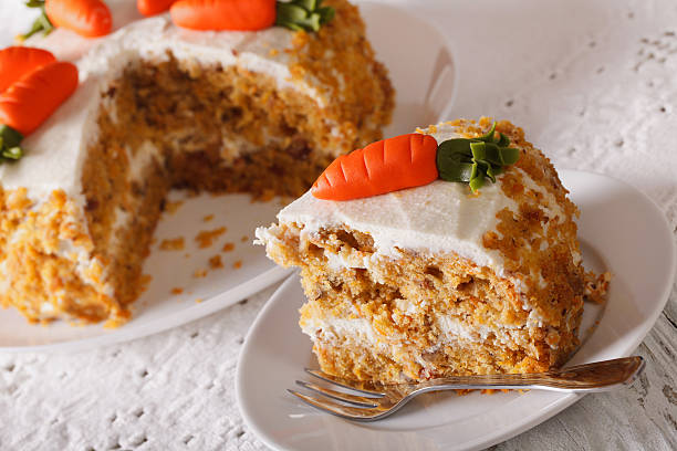 istock Sliced carrot cake on a plate closeup. horizontal 621260044
