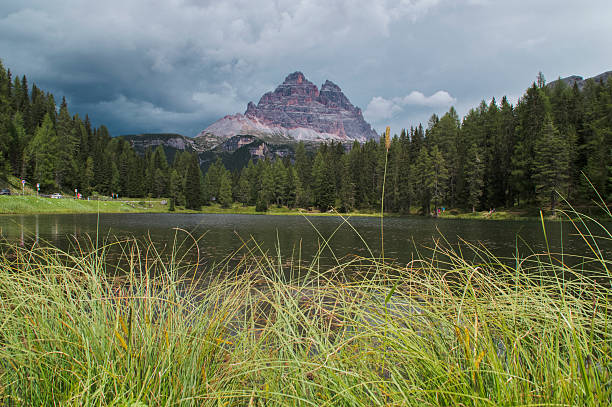 istock Three peaks of Lavaredo mountain from a lake 621261174