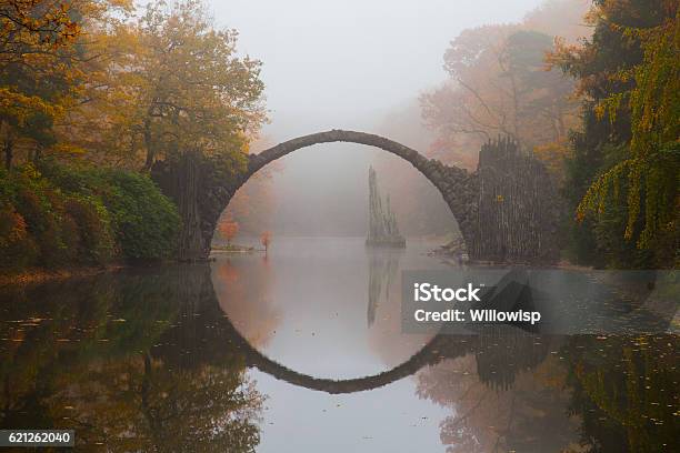 Rakotzbrücke In Early Morning Mist Stock Photo - Download Image Now