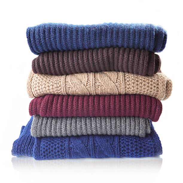 istock Pile of knitted winter clothes 621262430
