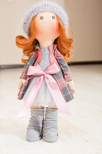 istock handmade doll with curly red hair 621262502