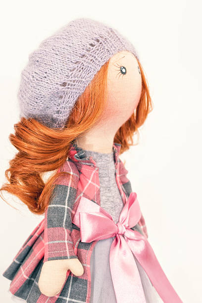 istock handmade doll with curly red hair 621262574