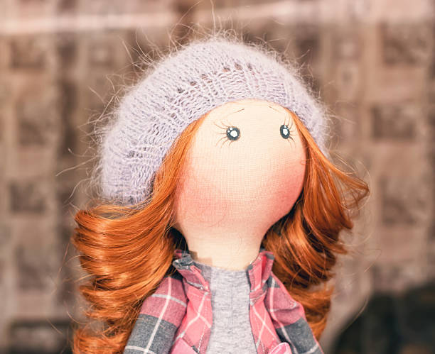 istock handmade doll with curly red hair 621262602
