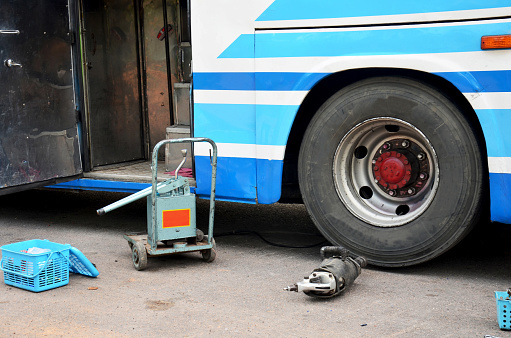Tools and equipment for repairing and fix change wheel tire of bus broken and explosion on the road at countryside in Mahasarakham, Thailand