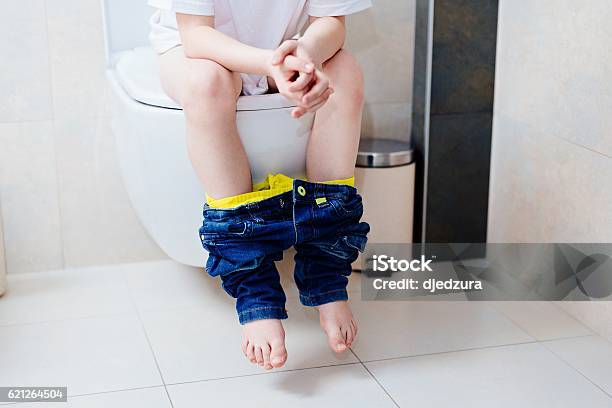Little 7 Years Old Boy On Toilet Stock Photo - Download Image Now - Child, Toilet, Boys