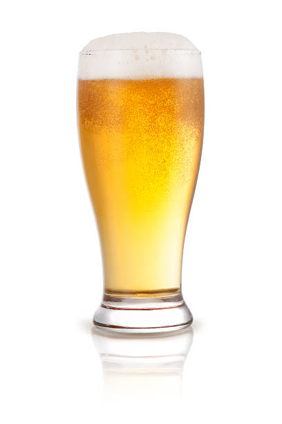 istock Fresh beer in a glass isolated on a white background 621265936