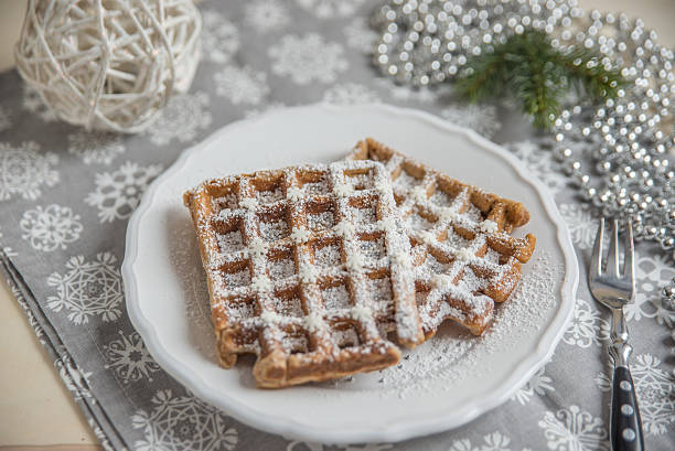 istock Christmas Waffles with sugar and sprinkles 621266292