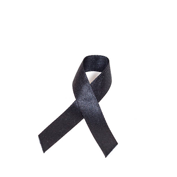 istock Black awareness ribbon on white background 621266986