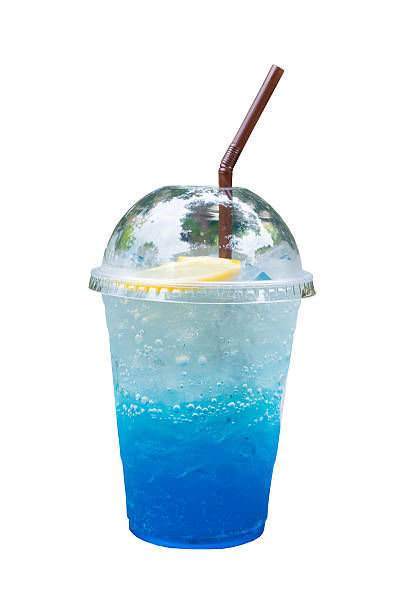 istock blue lemon soda on wooden isolated white background. clipping path 621268228