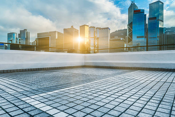 istock modern skyscrapers standing against blue sky 621268446