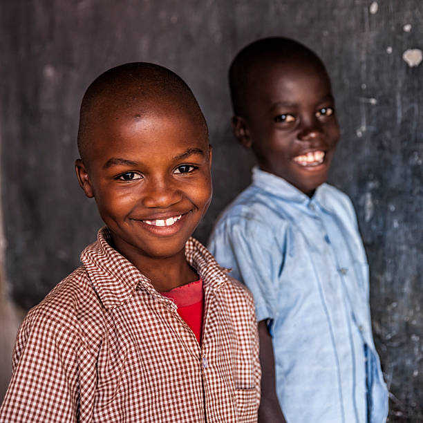 istock African young boys are learning English language, orphanage in Kenya 621269422