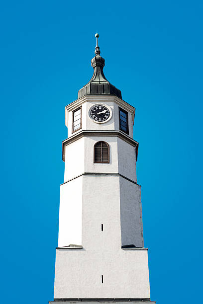 tower clock on blue background - fugacity imagens e fotografias de stock
