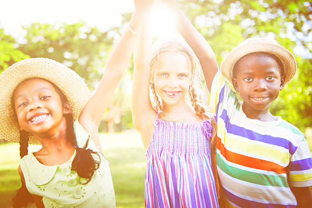 istock Children Outdoors Playing Cheerful Together Concept 621272200