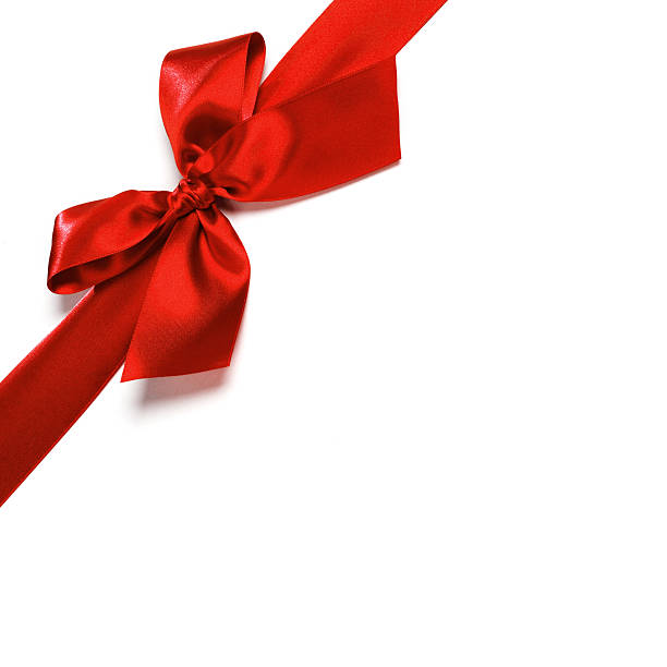 istock Red satin bow ribbon on white 621272530