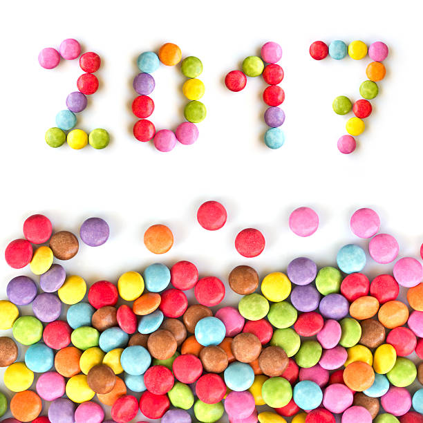 istock 2017 colorful candies  isolated on white background 621273540