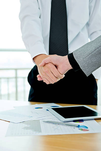 istock Shaking hand for a deal 621348870