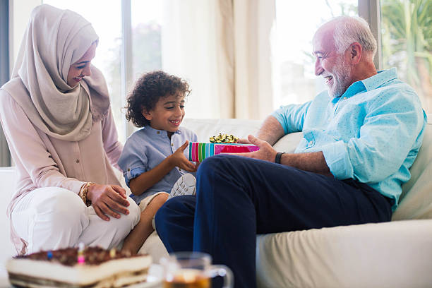 istock Three generation family celebrating a birthday in Dubai. 621350614