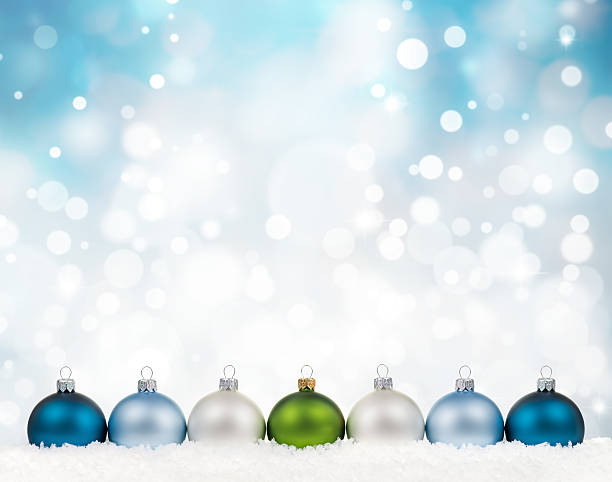 istock Christmas Balls in Line on Snow 621350744