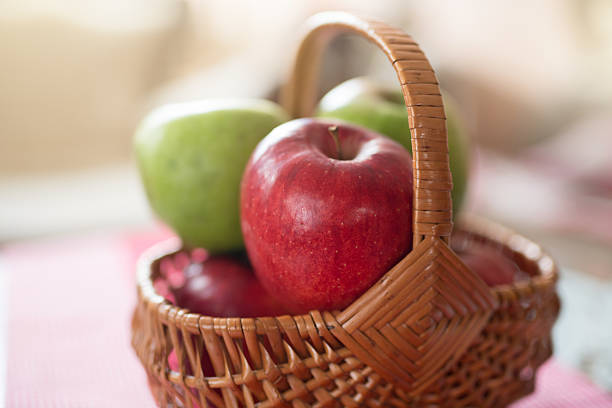 Fresh apples in a basket