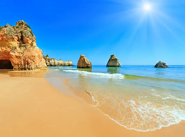 Photo of Algarve sunshiny beach Dos Tres Irmaos (Portugal)