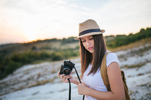 istock Woman photographer 621352144