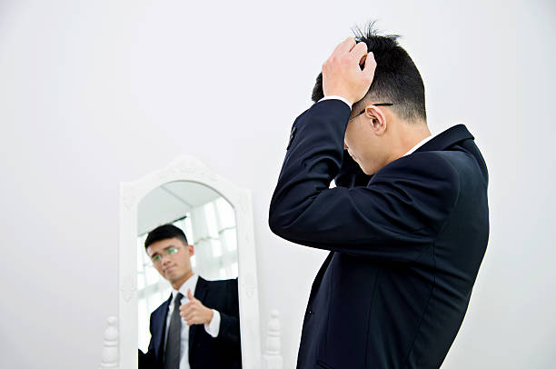 istock Businessman with bipolar disorder 621352712