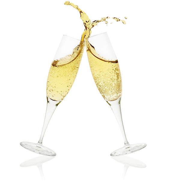 two champagne glasses toasting on white background - champagne champagne flute pouring wine imagens e fotografias de stock