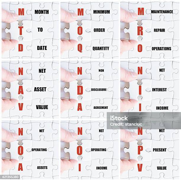 Hand Of Business Man Completing The Puzzle Stock Photo - Download Image Now - Absence, Abundance, Acronym