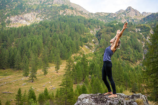 istock Yoga exercises in nature 621355564