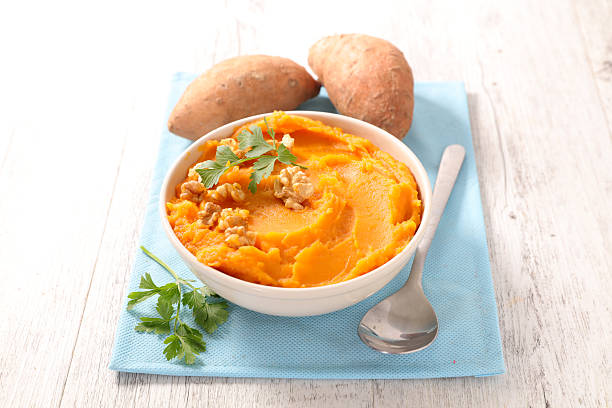 mashed sweet potato mashed sweet potato mashed stock pictures, royalty-free photos & images