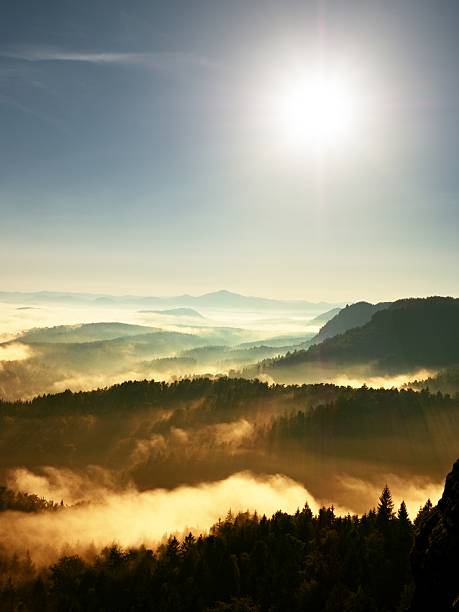 istock Colorful fall daybreak. Misty awakening in  beautiful hills. 621356598
