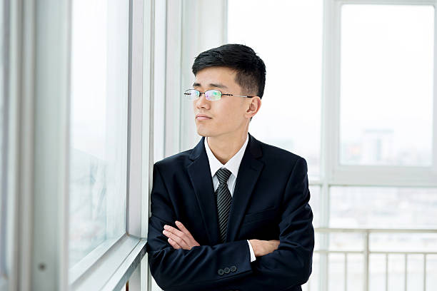 istock Young asian businessman in office 621357076