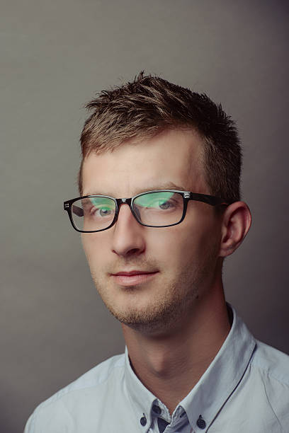 istock Portrait of a smart serious young man 621357382
