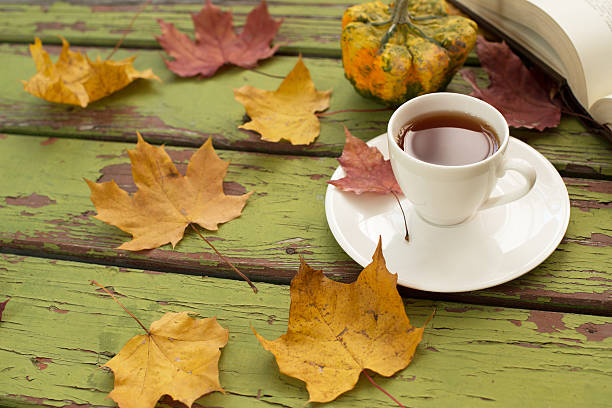 istock Decorative gourd and tea on a dark wooden table 621359374