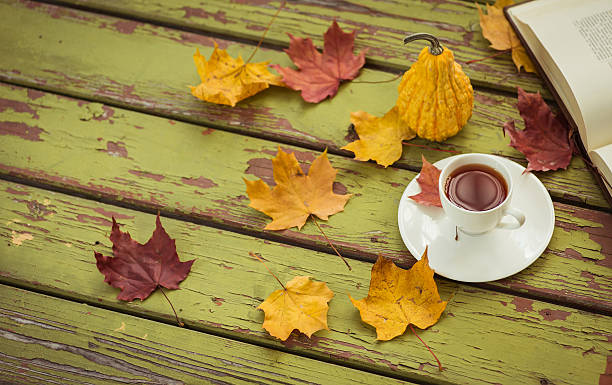 istock Decorative gourd and tea on a dark wooden table 621359484