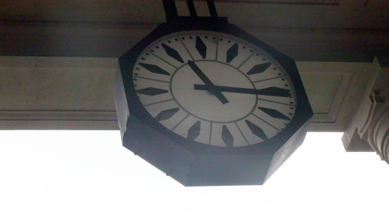 Station Clock Against Sky