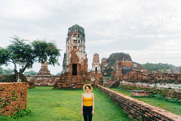 istock Woman near  ancient Buddhist Temple 621363278