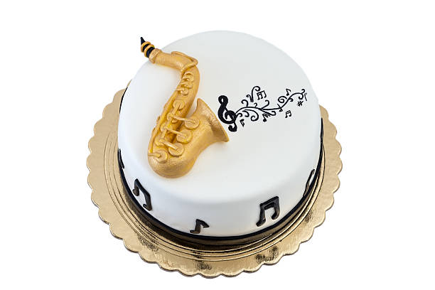 istock Creative cake tool saxophone, on the day of birth. 621364258