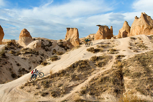 Mountain bikers exploring beautiful rocky terrain