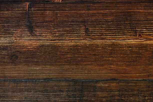 brick-red wood planks from an old house - wood circular saw dirty old imagens e fotografias de stock