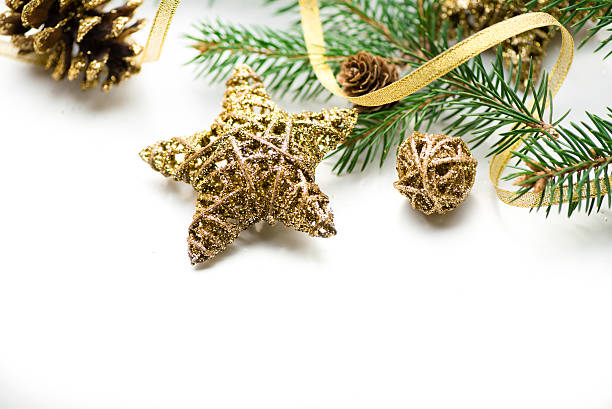 istock Christmas background. New year. 2017. tree, gold, cones, ornaments. White 621368258