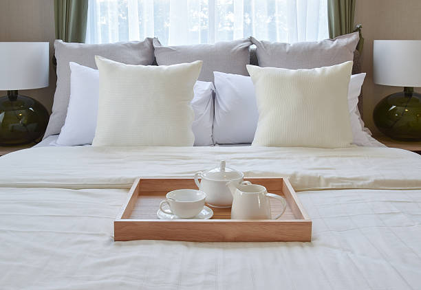 istock bedroom interior design with decorative tea set on bed 621368792
